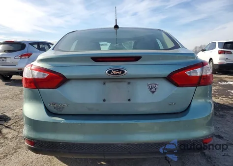 2012 Ford Focus Se z USA, uszkodzony, nr VIN 1FAHP3F25CL213544